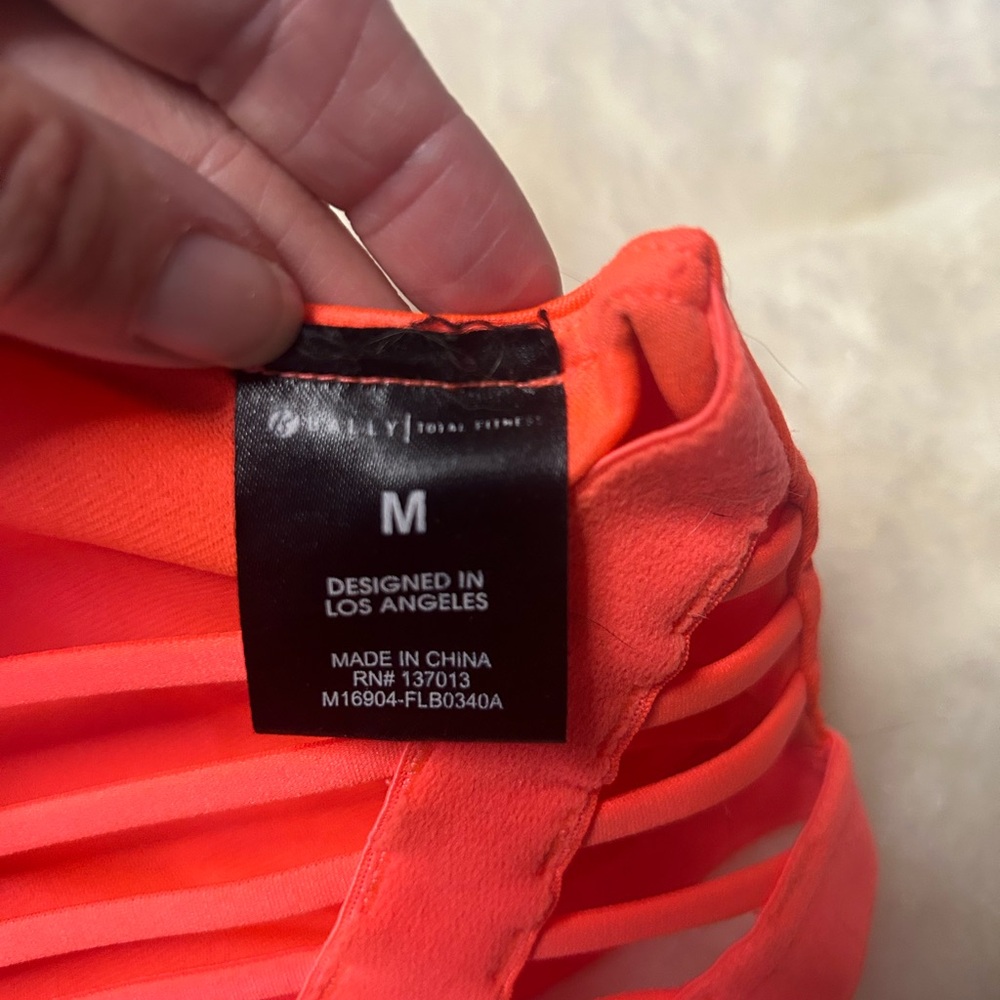Medium bright orange sports bra